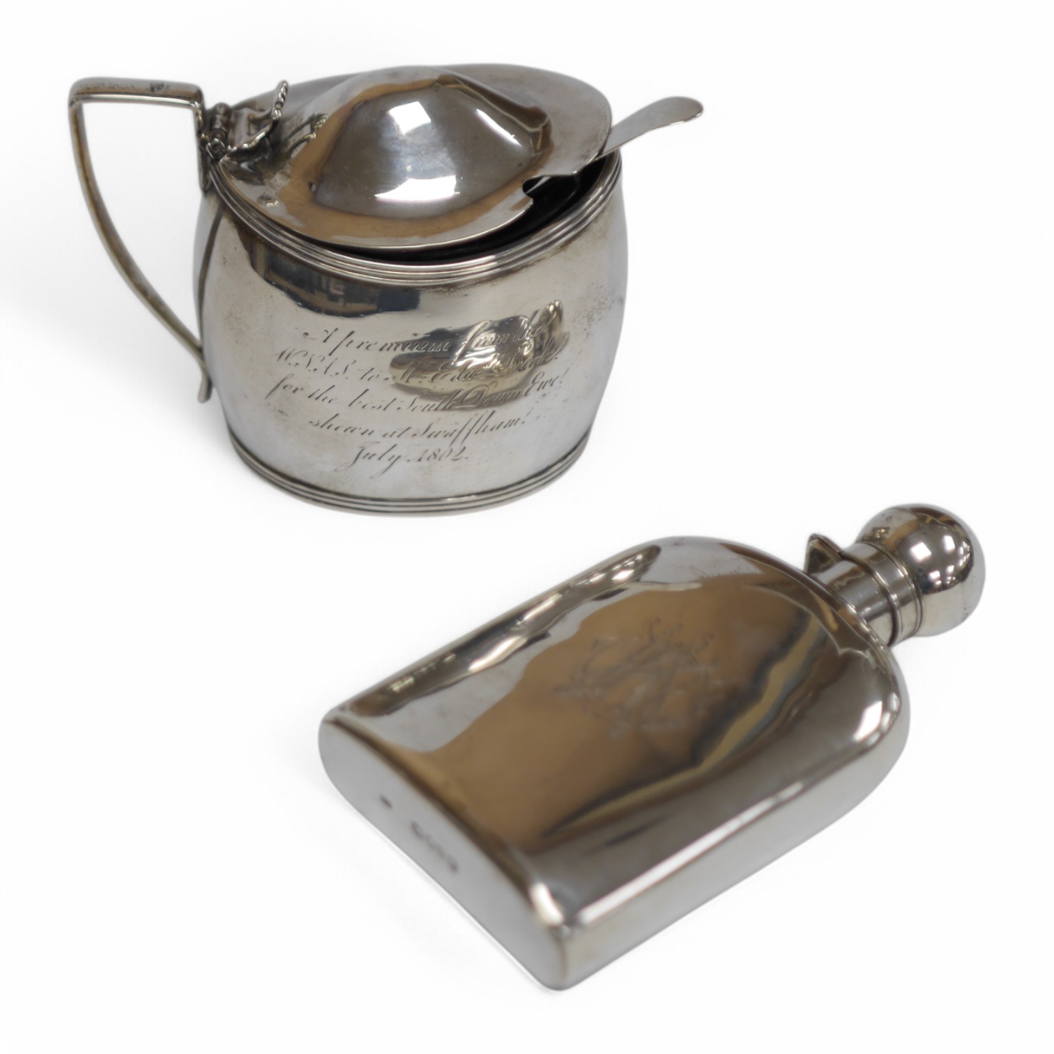 A late Victorian silver hip flask, with engraved monogram, by George Brace, London, 1884, 12.7cm (lead patch), together with a George III silver oval mustard, by Charles Fox & James Turner, London, 1802, (a.f.), with ass